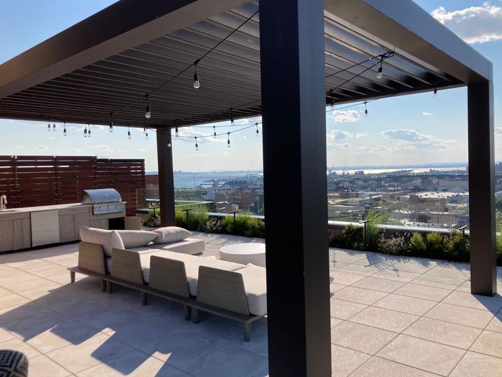 Rooftop Patio with Pergola and Outdoor Kitchen